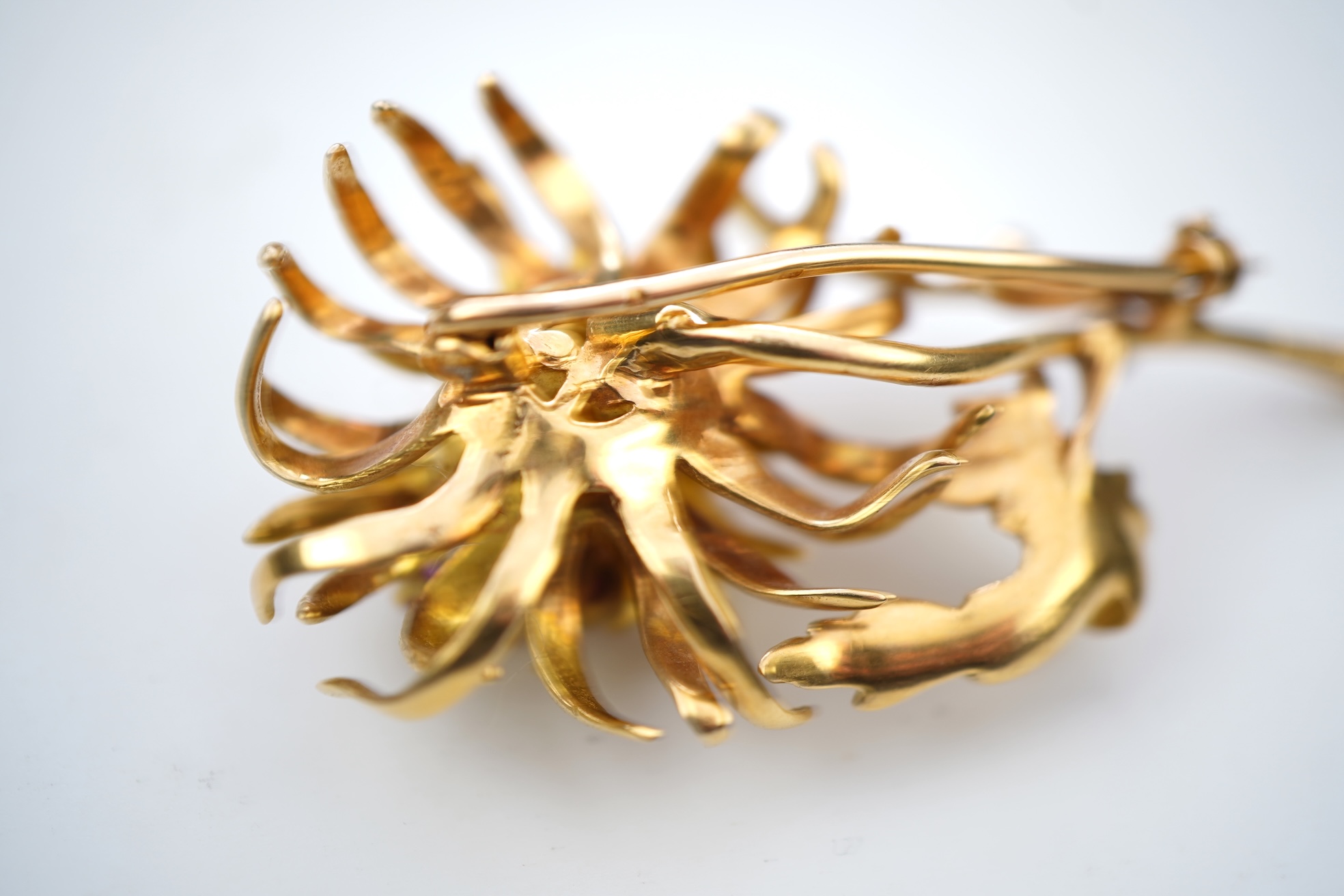 Ben Rosenfeld, a gold and ruby brooch, circa 1977